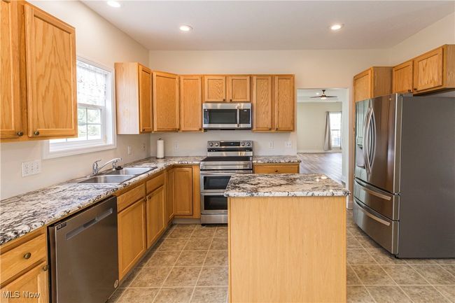 Kitchen with new counter tops and appliances | Image 10