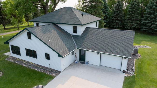 Heat coils to prevent ice build up on the roof, leaf guard gutters | Image 49