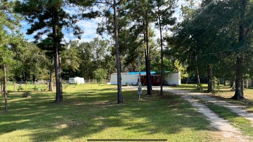 406 County Road 3415, Cleveland, TX, 77327-1456 | Card Image