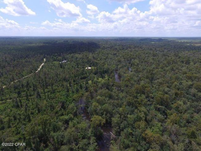10012 Sw Windsong Way, Home with 3 bedrooms, 3 bathrooms and null parking in Blountstown FL | Image 82