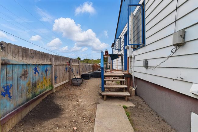 View of yard featuring fence | Image 32