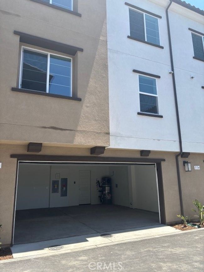 2 car enclosed garage with direct home access. | Image 39