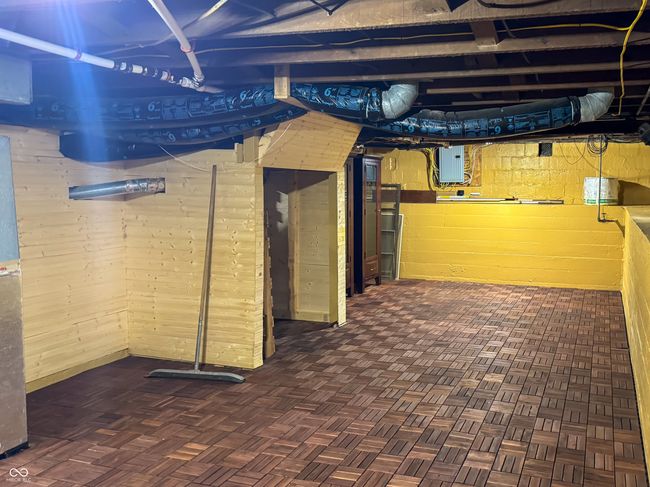 unfinished below grade area featuring electric panel | Image 45