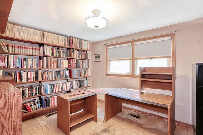 Home office with wood finished floors | Image 28