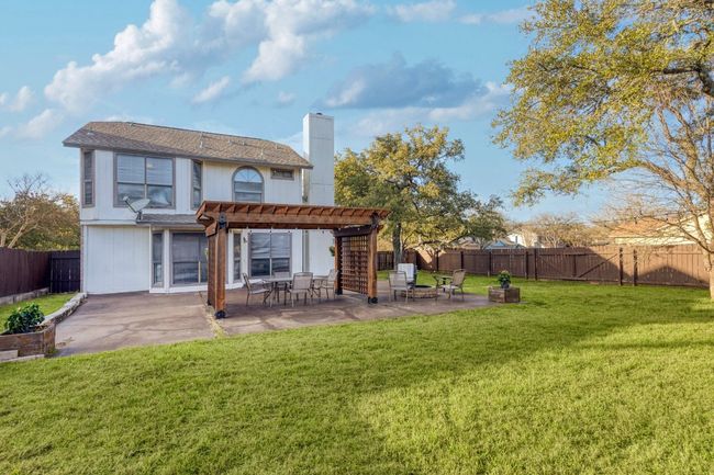 The large backyard space gives you room to get creative—whether you’re planning a garden, setting up a play area, or even just enjoying a quiet afternoon under the shade of mature trees | Image 29