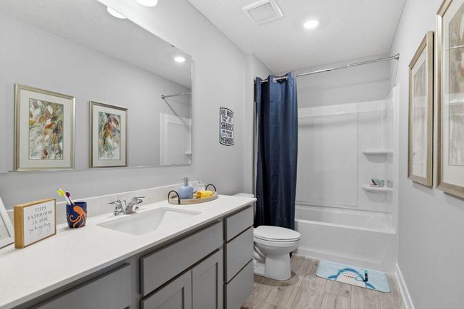 Upper-level hall bath offers a great solution for a busy family. Photo is of model home. Colors and options may vary. Ask Sales Agent for details. | Image 33