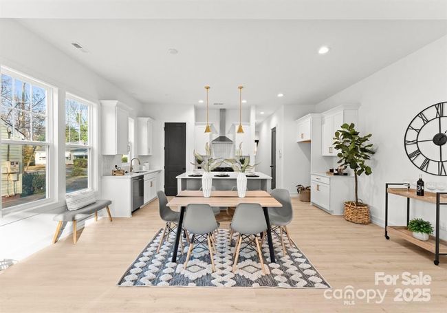 10ft ceilings with 8 ft tall black interior doors on the first floor. | Image 7