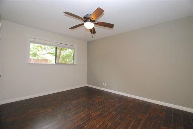 Guest bedroom 2 with ceiling fan | Image 15