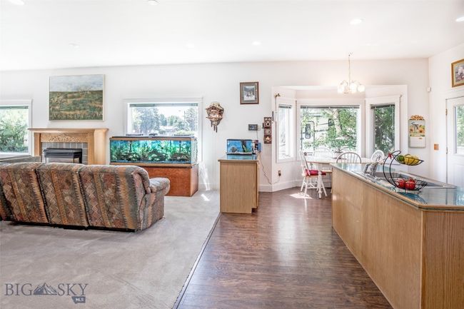 kitchen, dining, living area and natural gas stove. Lots of natural light! | Image 10