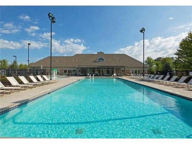 Your assoc fees include full access to the walkable and beautiful Waters Edge Community Center! pool, gym, and party room with kitchen! | Image 20