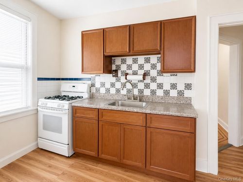 1-fl-6442 Catalpa Avenue, New York, NY, 11385 | Card Image
