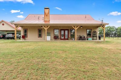 Back of property featuring a yard and a patio area | Image 2