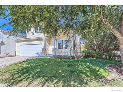 1202 Fall River Circle, House other with 4 bedrooms, 2 bathrooms and 2 parking in Longmont CO | Image 3