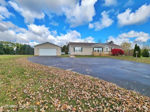 214 W Pinconning Rd, Pinconning, MI, 48650-7946 | Card Image