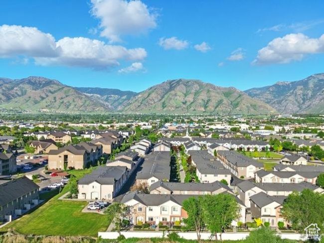 Aerial perspective of suburban area featuring a mountainous background | Image 35