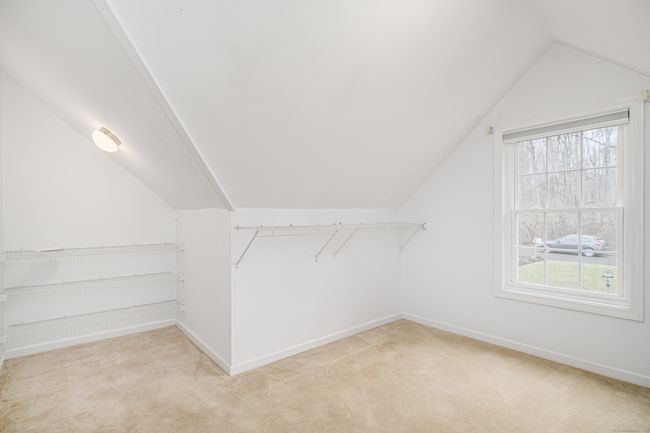 Large walk-in closet in primary bedroom. | Image 21