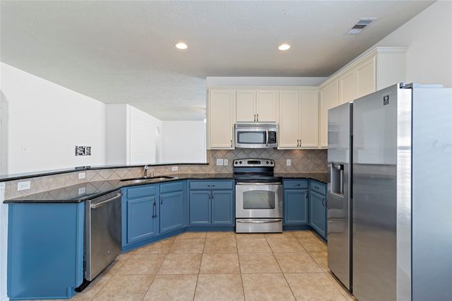 23307 W Pine Ivy Ln, House other with 4 bedrooms, 2 bathrooms and 2 parking in Tomball TX | Image 10