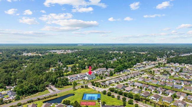 View of property location with nearby suburban area and a heavily wooded area | Image 33