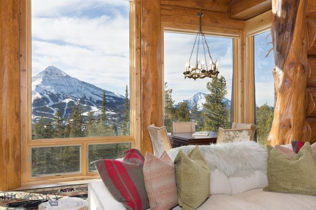 Main level great room with stunning Lone Mountain and Fan Mountain views. | Image 42