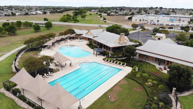 Community pool featuring fence and a patio | Image 29