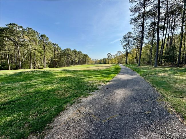 View of golf path where lot is on the right. | Image 8