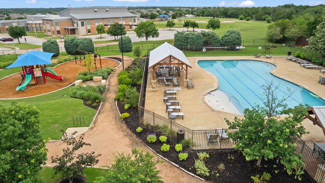 Community pool featuring a patio area | Image 39