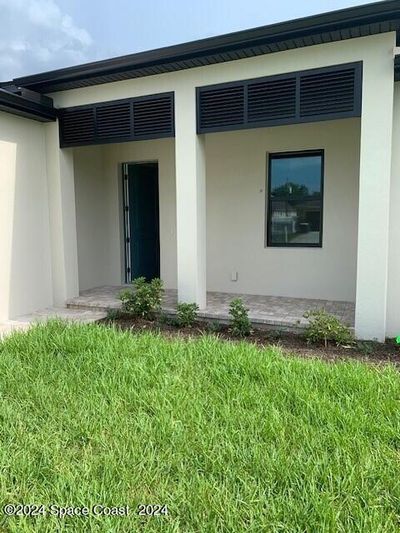 558 Hamy Street, House other with 4 bedrooms, 3 bathrooms and null parking in Palm Bay FL | Image 2