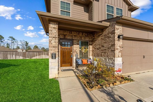 Home features a covered porch | Image 5
