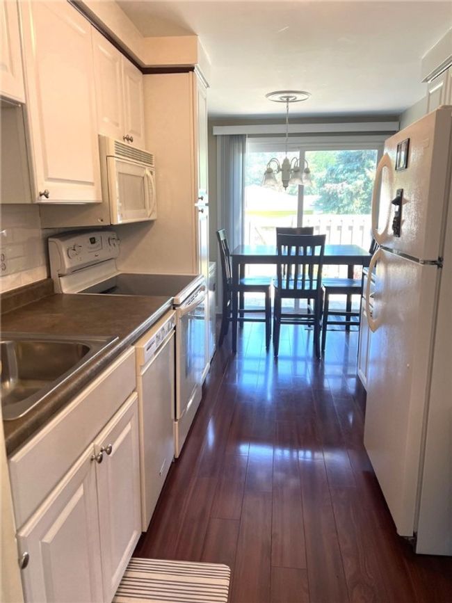63 Springwood Dr, Townhouse with 2 bedrooms, 2 bathrooms and null parking in Webster NY | Image 4