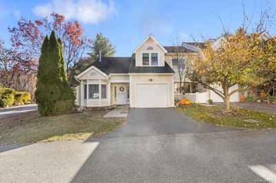 View of front of property featuring a garage | Image 1