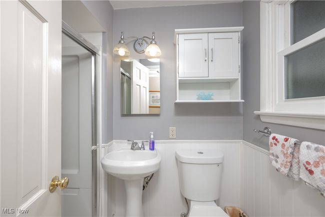Bathroom featuring toilet and wainscoting | Image 20