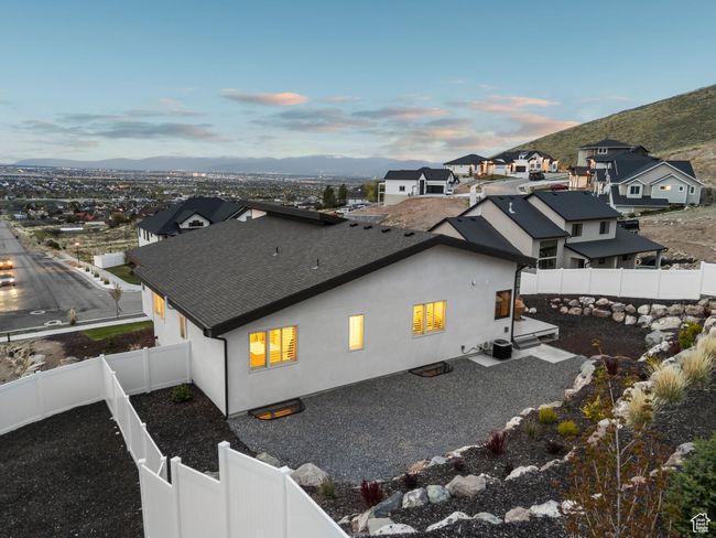 Aerial view at dusk featuring a residential view and a mountain view | Image 73