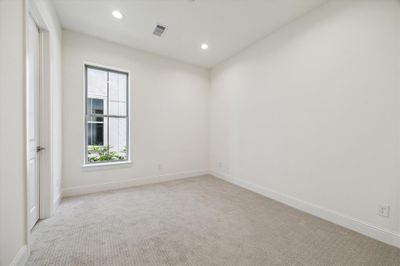 1st floor bedroom with natural light. | Image 3