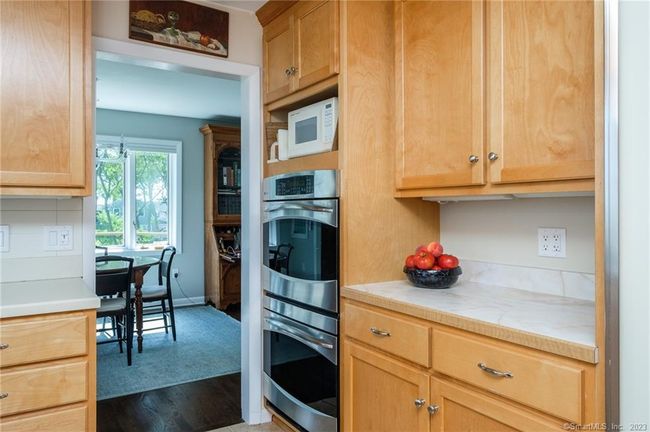 Kitchen opens to the dining room/living room | Image 15