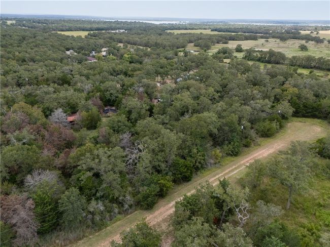 Birds eye view of property with a view of trees | Image 5