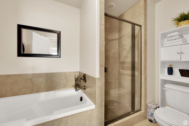 Bathroom with a bath and a shower stall | Image 16