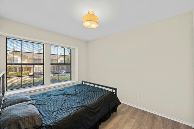 Bedroom #3 with light wood-style flooring and baseboards | Image 13