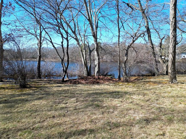 View of yard featuring a water view | Image 33