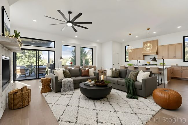 View from entry of Great Room, including living/family room, dining room, and kitchen (virtually staged) | Image 12