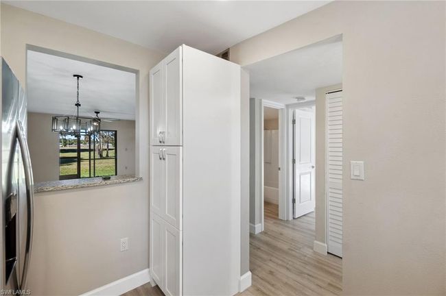 Corridor with light wood-type flooring | Image 8
