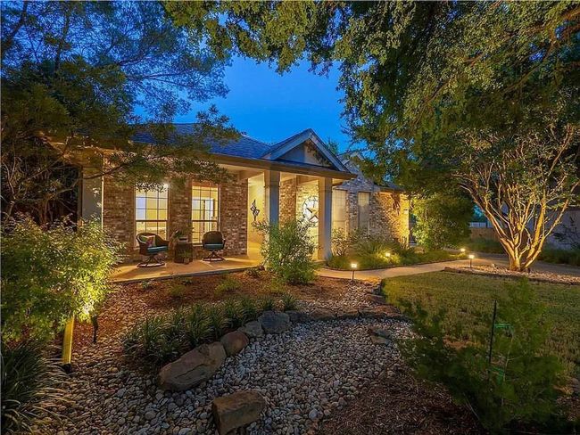 View of front of property with brick siding and a patio | Image 32
