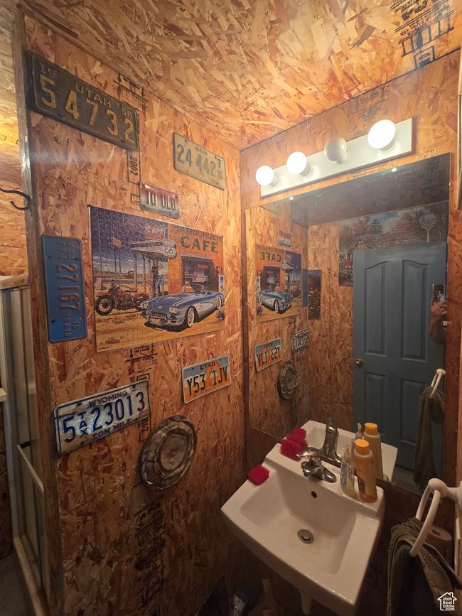 Bathroom featuring a sink | Image 66