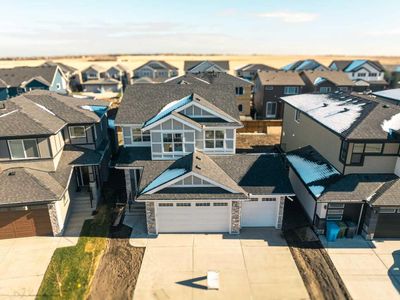 203 Kinniburgh Loop, House detached with 4 bedrooms, 3 bathrooms and 6 parking in Chestermere AB | Image 2