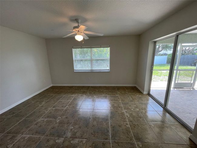 Family room with slider to lanai | Image 11
