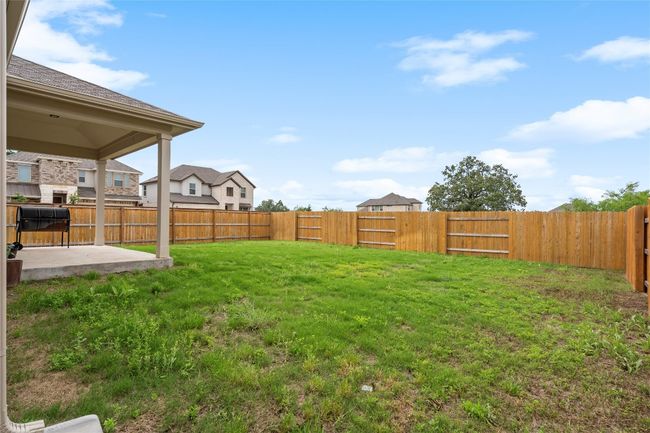 View of yard featuring a patio | Image 38