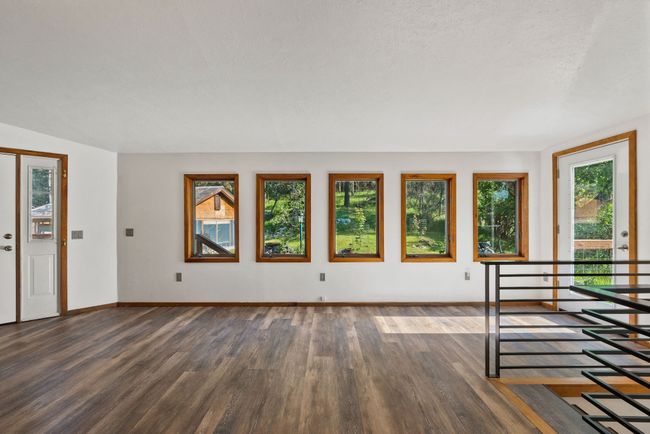 Bright living room with abundant natural light | Image 10