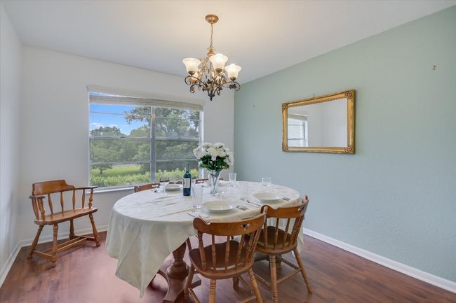 Large dining room has room for a buffet & china hutch, views the shaded front yard. | Image 12