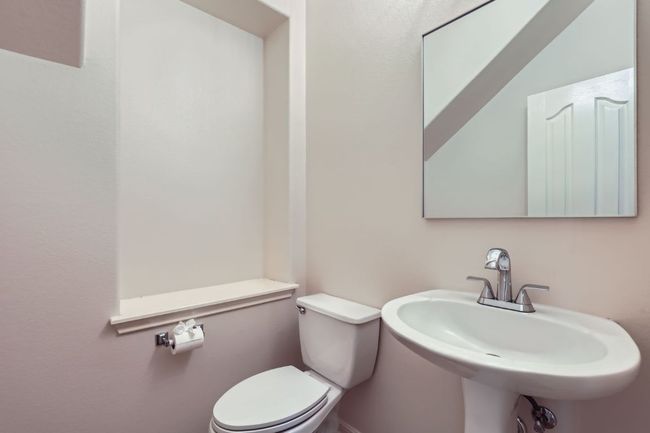 Powder room downstairs off foyer | Image 32