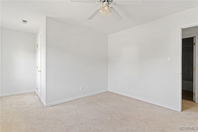 Unfurnished room with light carpet and ceiling fan | Image 26
