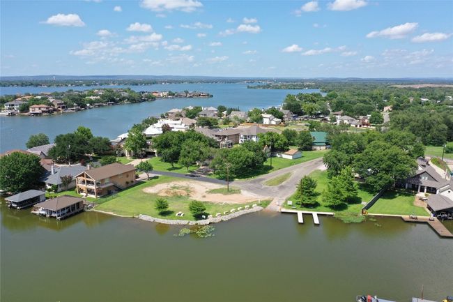 Aerial perspective of suburban area featuring a large body of water | Image 32
